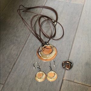 Versus necklace, earring, & ring set.